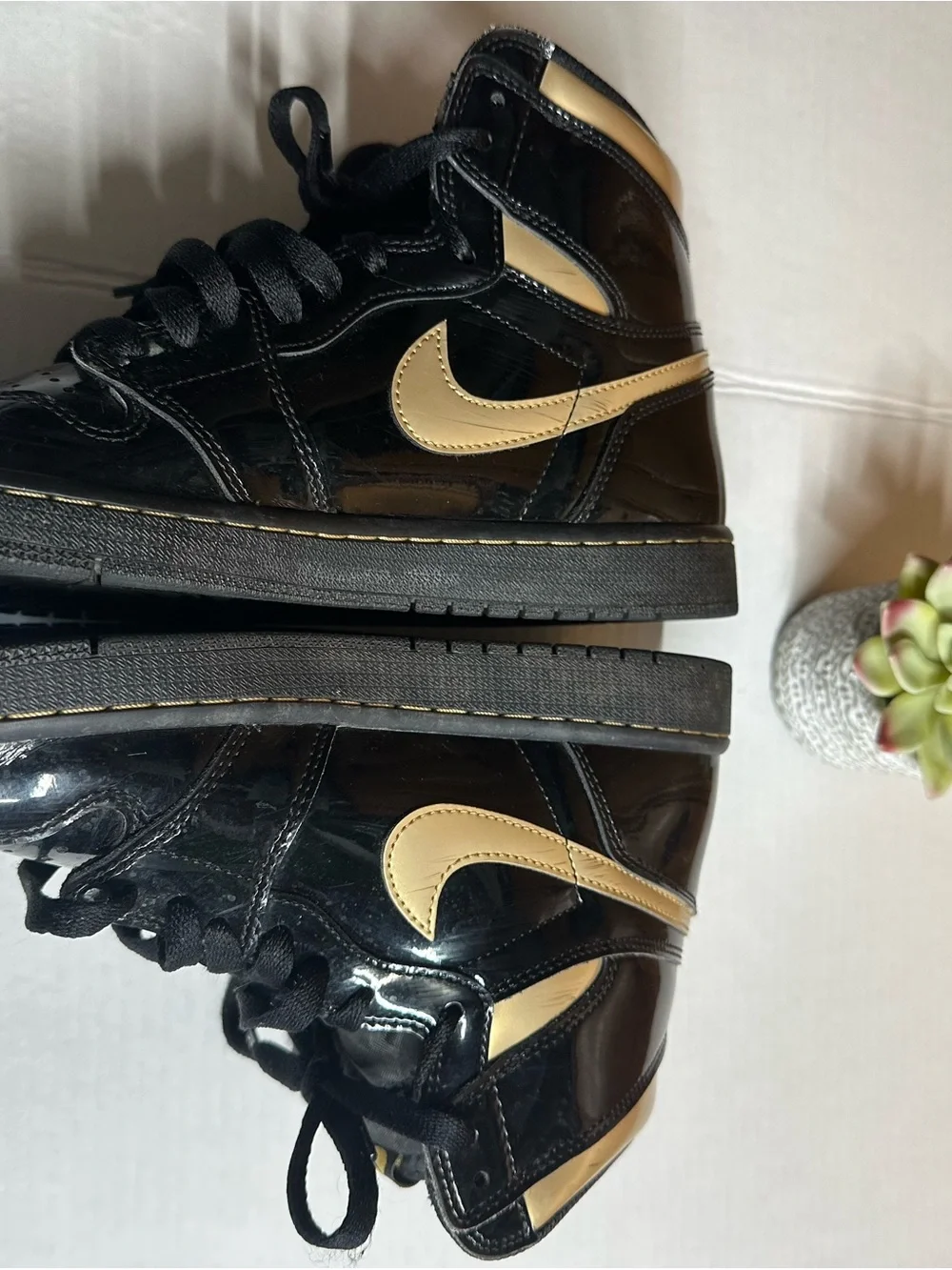 Nike Air High-Top Sneakers in Black with Gold Logo